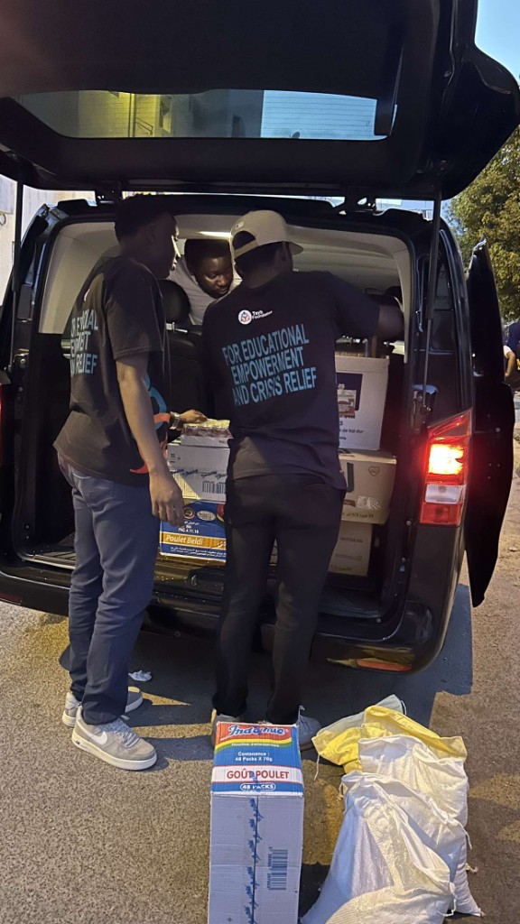 Tayb Foundation Morocco outreach — Volunteers sorting food packages for distribution