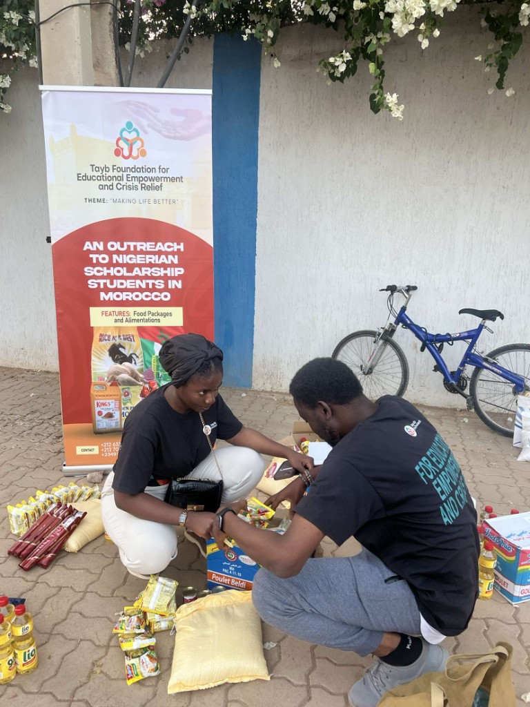Tayb Foundation Morocco outreach — Volunteers sorting food packages for distribution